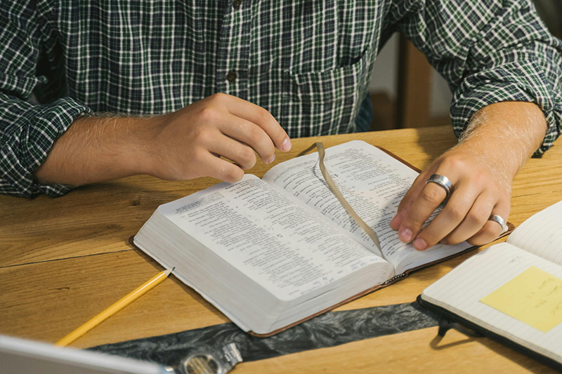 Man Studying the Bible